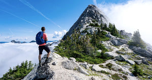 Hiker hiking up a mountain